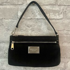 Fit all your necessities into this cute little Michael Kors clutch!